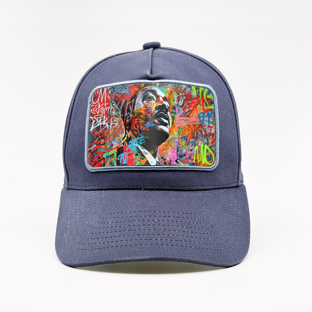 Graffiti King – Martin Luther King Jr. on the Marinblå Cotton Classic