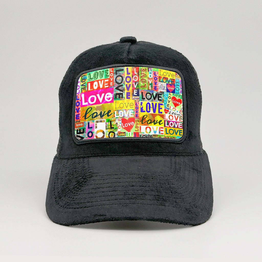 Love Typography Collage on the Midnatt Velvet Trucker