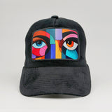 Abstract eyes on the Midnatt Velvet Trucker
