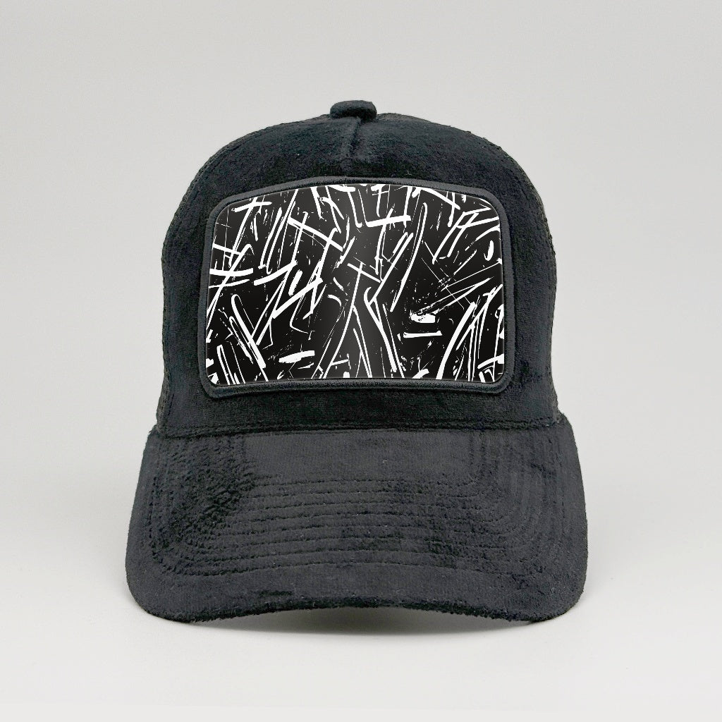 Untamed Canvas: An Abstract Grunge Study on the Midnatt Velvet Trucker