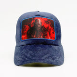 Orc with red fire behind on the Fjord Velvet Trucker