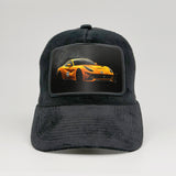 Yellow Ferrari F12 on the Midnatt Velvet Trucker