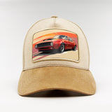 Vintage red muscle car on the Björk Suede Classic