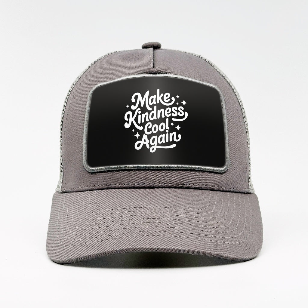 Make kindness cool again on the Aska Cotton Trucker