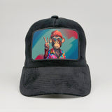 Unbothered Monkey - Peace Sign on the Midnatt Velvet Trucker