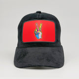 Pop-Art Peace Sign on the Midnatt Velvet Trucker