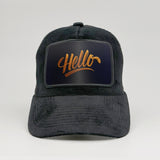 Hello – Gilded Greeting on the Midnatt Velvet Trucker